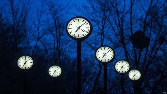 Clocks of the art installation 'Zeitfeld' (time field) by German artist Klaus Rinke are seen in Duesseldorf, western Germany, on March 23, 2021. - Clocks in Germany will be changed to summer time and set back by one hour on Sunday, 28 March 2021. (Photo by Ina FASSBENDER / AFP)
